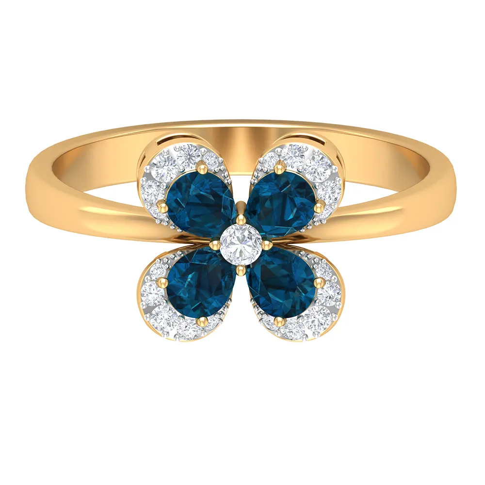 0.75 CT London Blue Topaz and Diamond Floral Ring