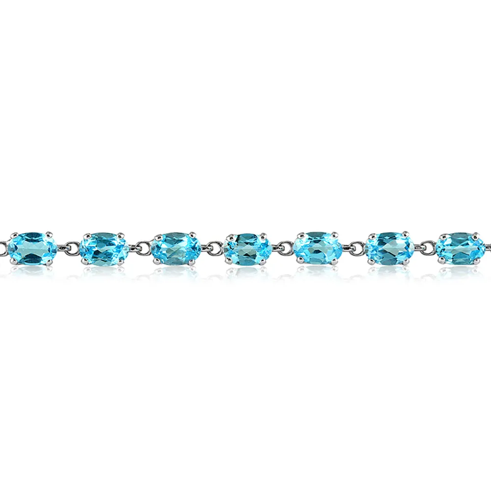 10 1/2 Carat Oval Blue Topaz Bracelet In 10K White Gold