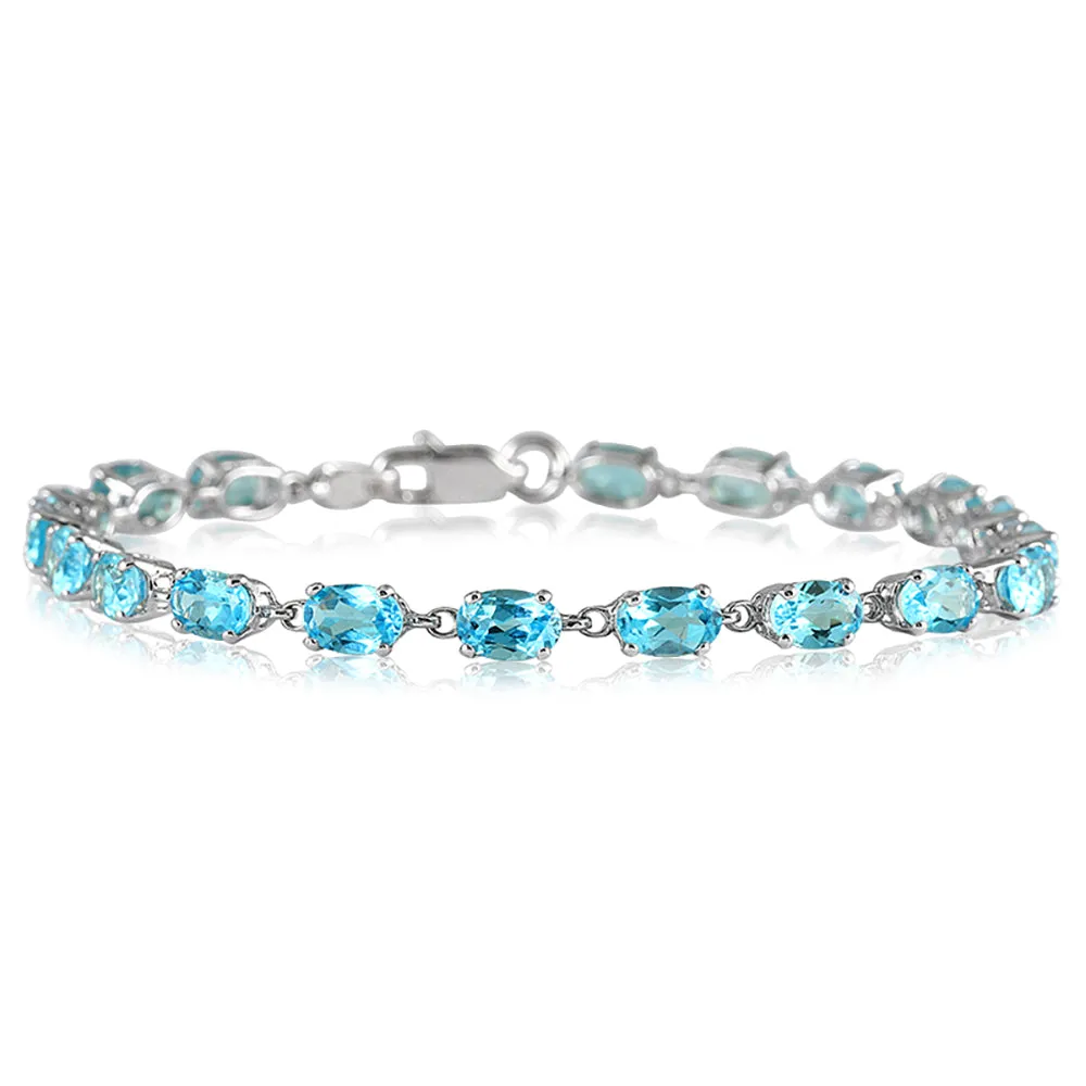 10 1/2 Carat Oval Blue Topaz Bracelet In 10K White Gold