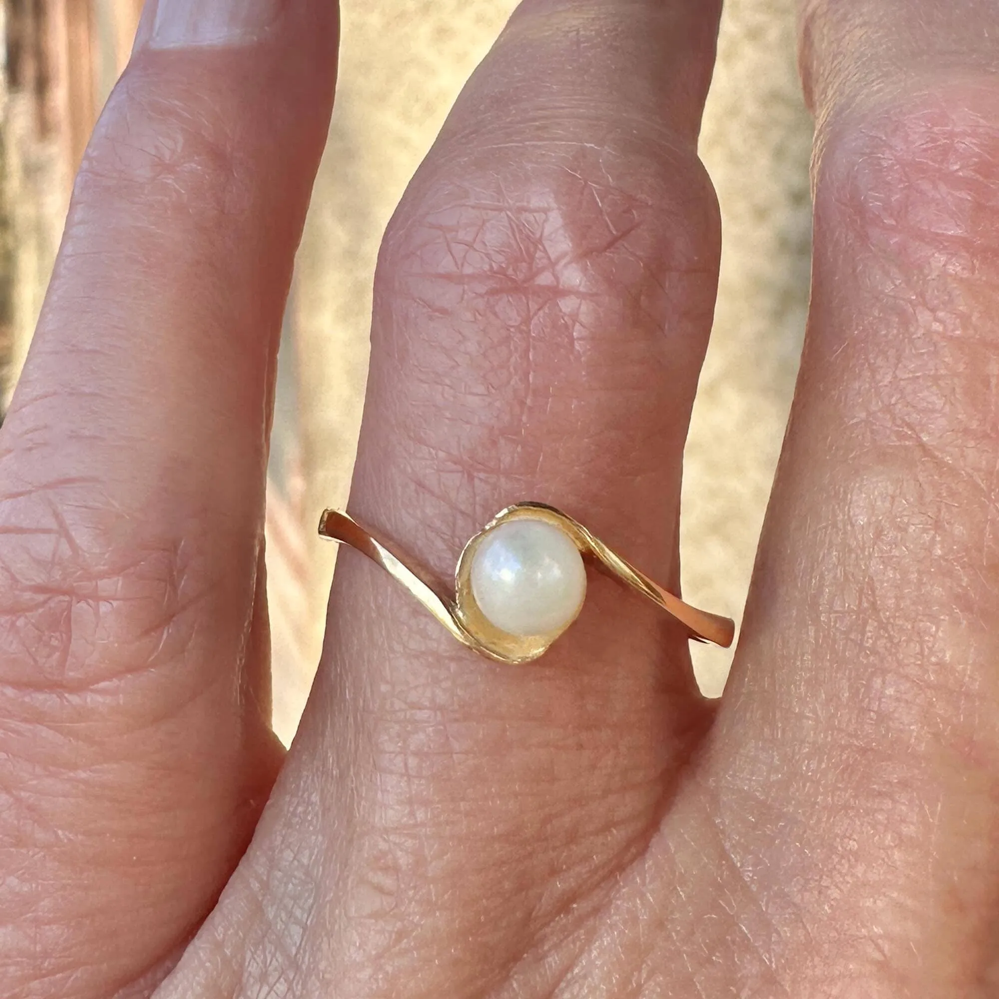 Elegant 14K Gold Bypass Pearl Solitaire Ring