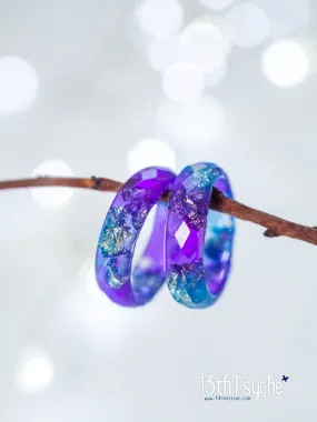 Purple and blue faceted resin ring with silver flakes